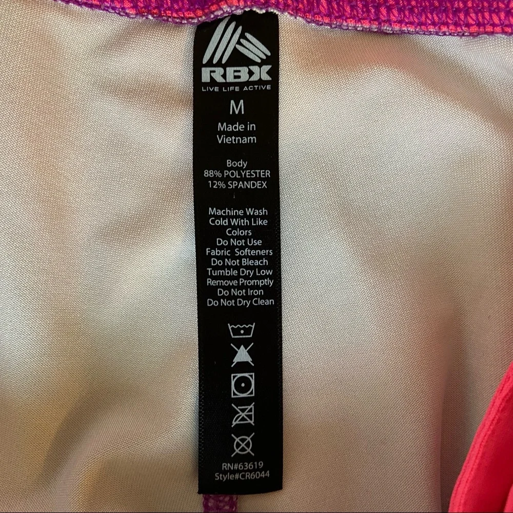 Women multi-colored Capri leggings.  Bright colors that are camouflage designed. - Picture 3 of 3